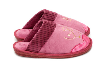 Female slippers isolated on a white background.