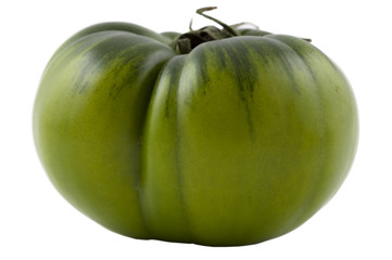 Green organic tomato isolated on white