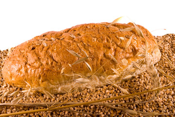 Bread on Wheat with Stalks of Cereals