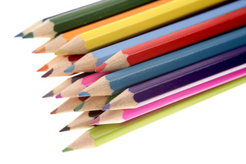 Colored pencils on white background