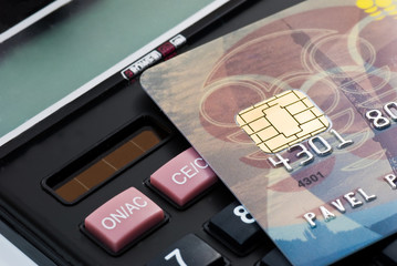 visa chip plactic card over business culculator