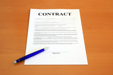 Contract document with blue pen (fictitious legal text)