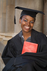 African American college student graduating with mortarboard