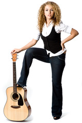 Fototapeta premium A pretty teenage girl with acoustic guiatr