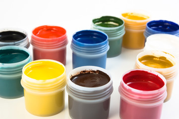 set of the watercolor gouache paints at the white background