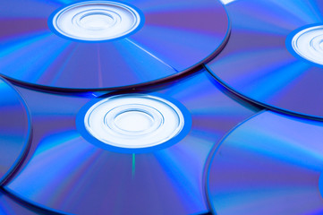 background of some colorful compact discs