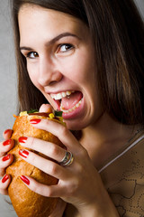 young beauty girl with big hot dog