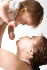 Mother's love. Cute baby 12 month with mother.