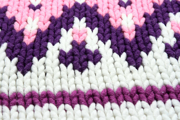 Pink triangles on white pullover