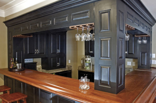 Custom-built Bar And Wood Cabinetry