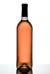 Rose wine bottle isolated on white.