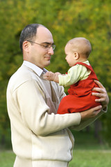 Fototapeta premium father and son outdoor portrait