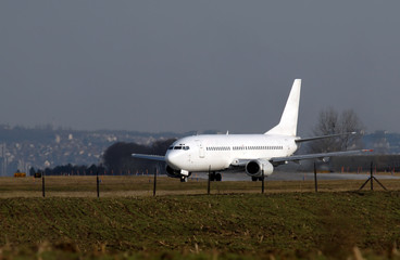 Passenger aircraft waiting for takeoff clirence short of runway