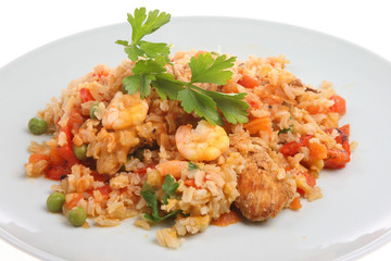 Spanish paella with chicken and king prawns