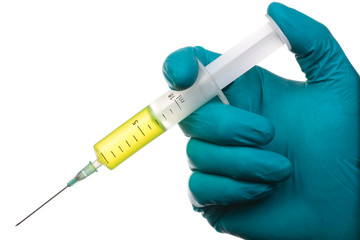 hand holds syringe with liquid. Isolated with clipping path