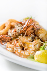 seafood main dish served with shrimps, crabs and calamari