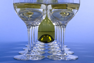 Rows of White Wine in Crystal Glasses