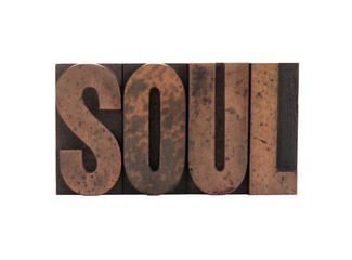 the word 'soul' in old, ink-stained wood letters