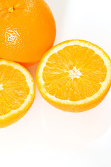 A shot of three fresh and delicious oranges
