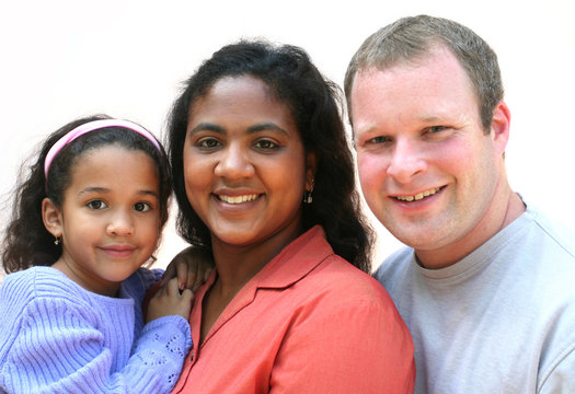 Mixed race family set on a white background