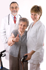 Healthcare workers and senior  © Alexander Raths