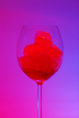 A cocktail in colorful light