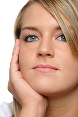 Fototapeta premium Portrait of teen girl against a white background