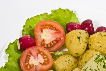 food series: tasty boiled potatoes with tomato, radish lettuce