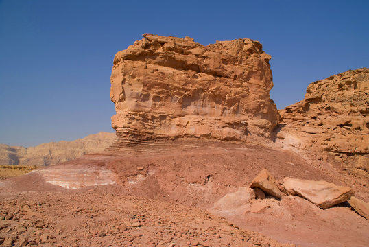 rock and red terrain, timna park, israel.