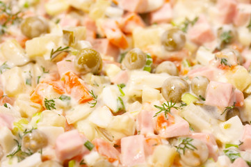 Meat salad with a peas, carrots and a potato