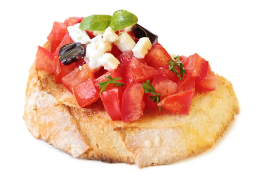 Bruschetta, with luscious diced tomatoes, and goat's cheese