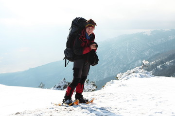 Backpackers in winter mountain