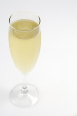 A glass of champagne isolated on a white