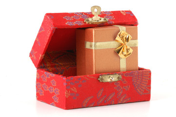 red chest with gift box inside