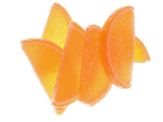 Translucent fruit jellies on white background
