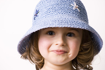 Happy girl in summer hat