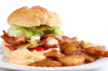 Home-made chicken and bacon burger