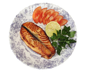 Grilled salmon on the plate with vegetable on white background