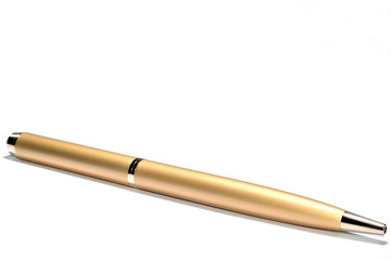 gold pen on a white background