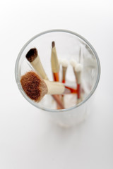 Make-up brushes in glass