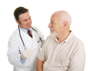 Fototapeta premium Senior man at the doctor finding out his temperature is good