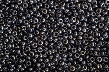 Leaden-colored beads background