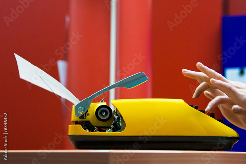 writing a document on a typewriter