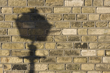 Lamp shadow on bricks