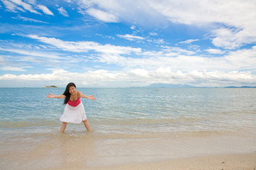 woman having fun by the beach