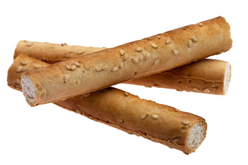 three sesame breadsticks isolated on white background
