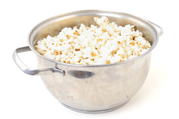 Full Aluminum pot with popcorn, on white .