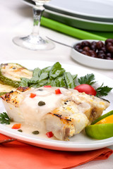 Grilled halibut with capers and pepper sauce 