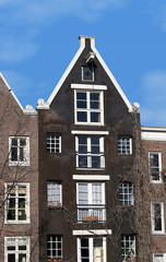 Fototapeta na wymiar Historical houses in the Netherlands (Amsterdam)