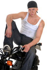 Fototapeta na wymiar Handsome young male motorcycle mechanic,